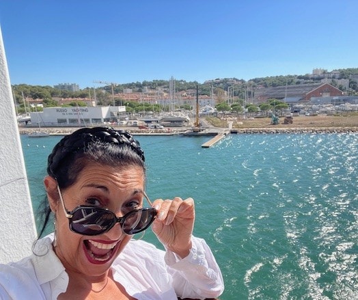 Lori Gian relaxing on a deck in France