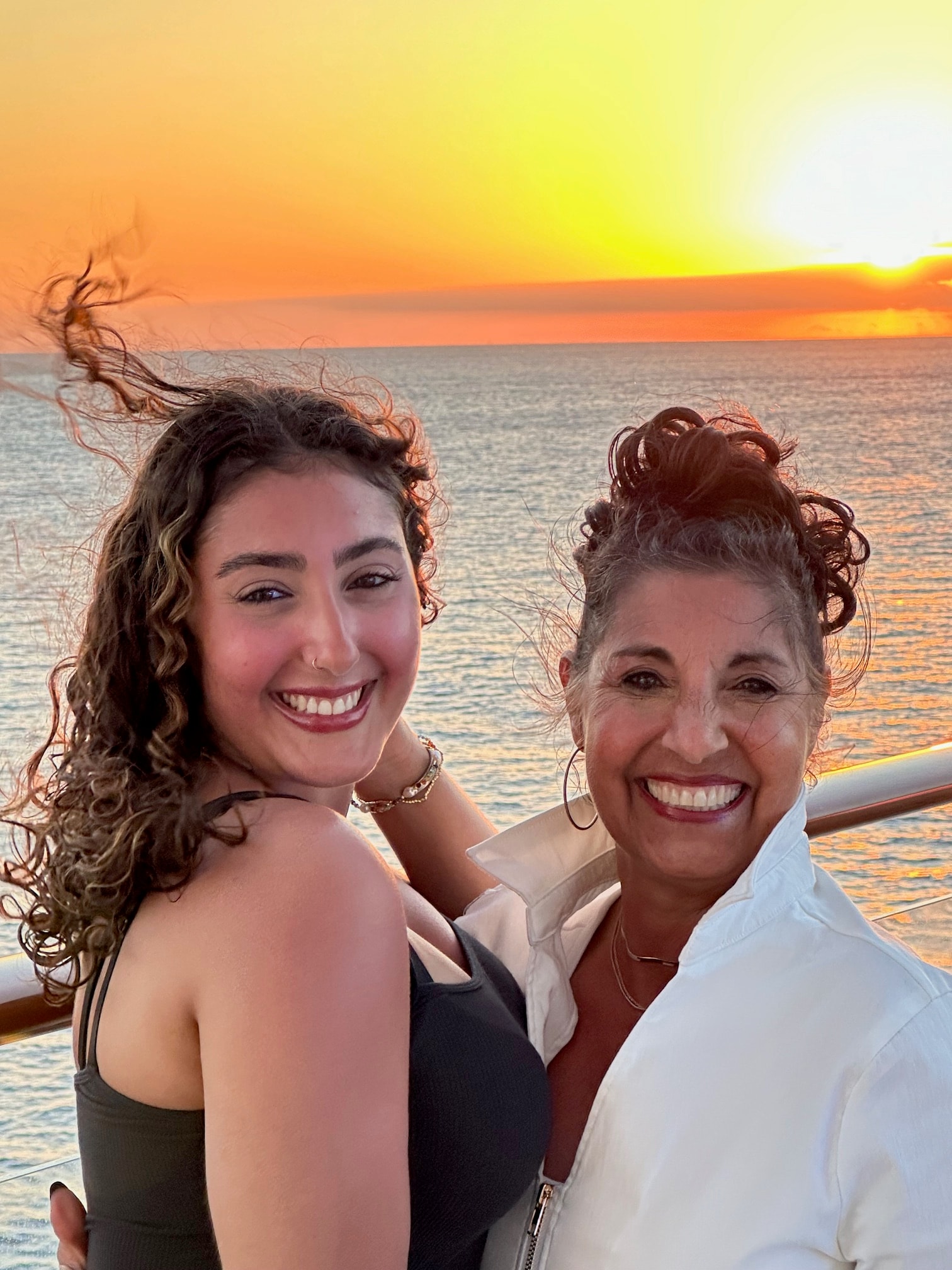 Women connecting and laughing together outdoors